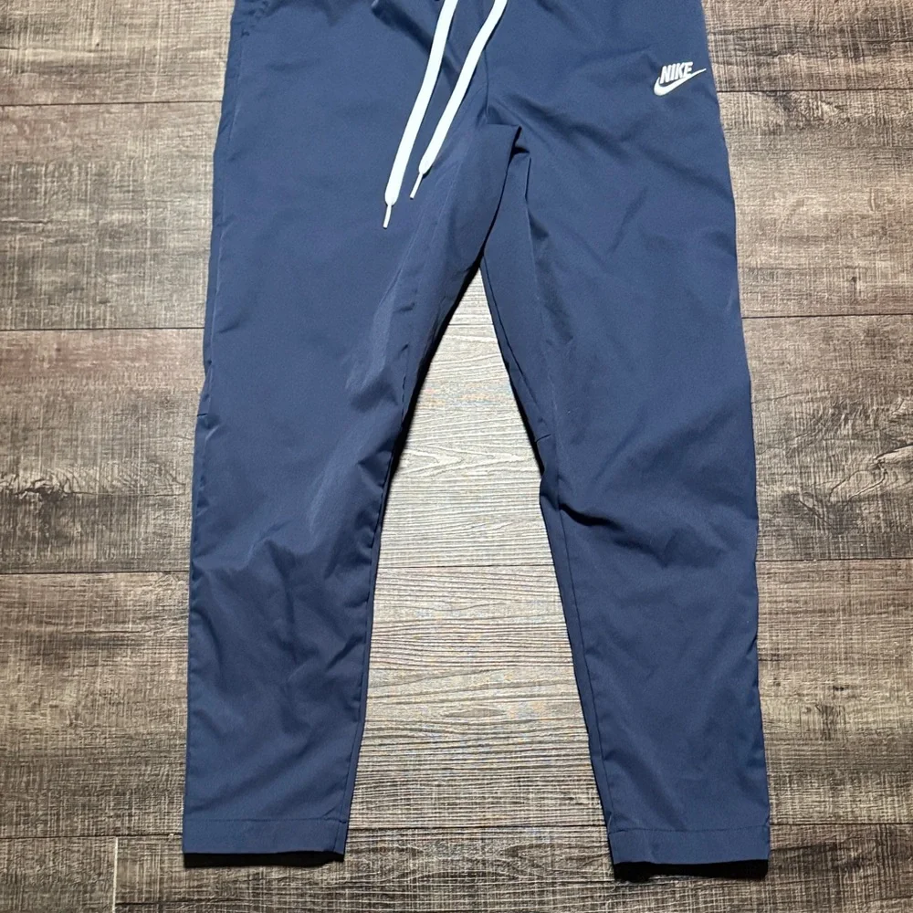 Nike Men's Navy Blue Joggers with White Drawstrings